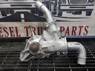 Good Used Ford 7.3L Power Stroke Water Pump Housing Assembly Part 1831005C2. Fixed Price $55.99.