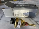 (c) International 1673785C92 Low Coolant Sender Gage. Fixed Price $90.00.