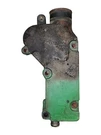 Used John Deere 6135 Outer Thermostat Housing - R524283. Fixed Price $204.75.